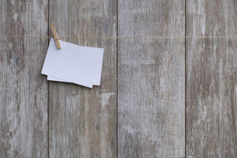 Paper clipped together on string